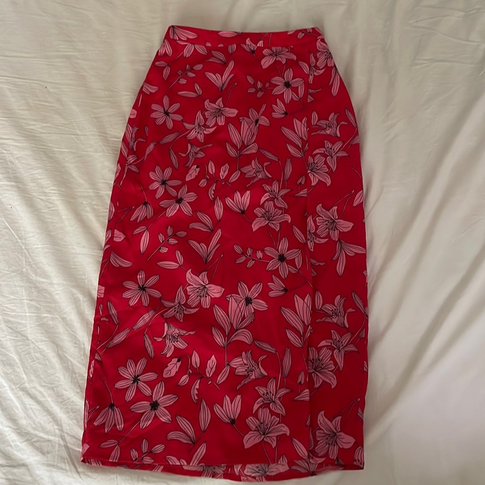 Camila Coelho floral midi skirt with slit.